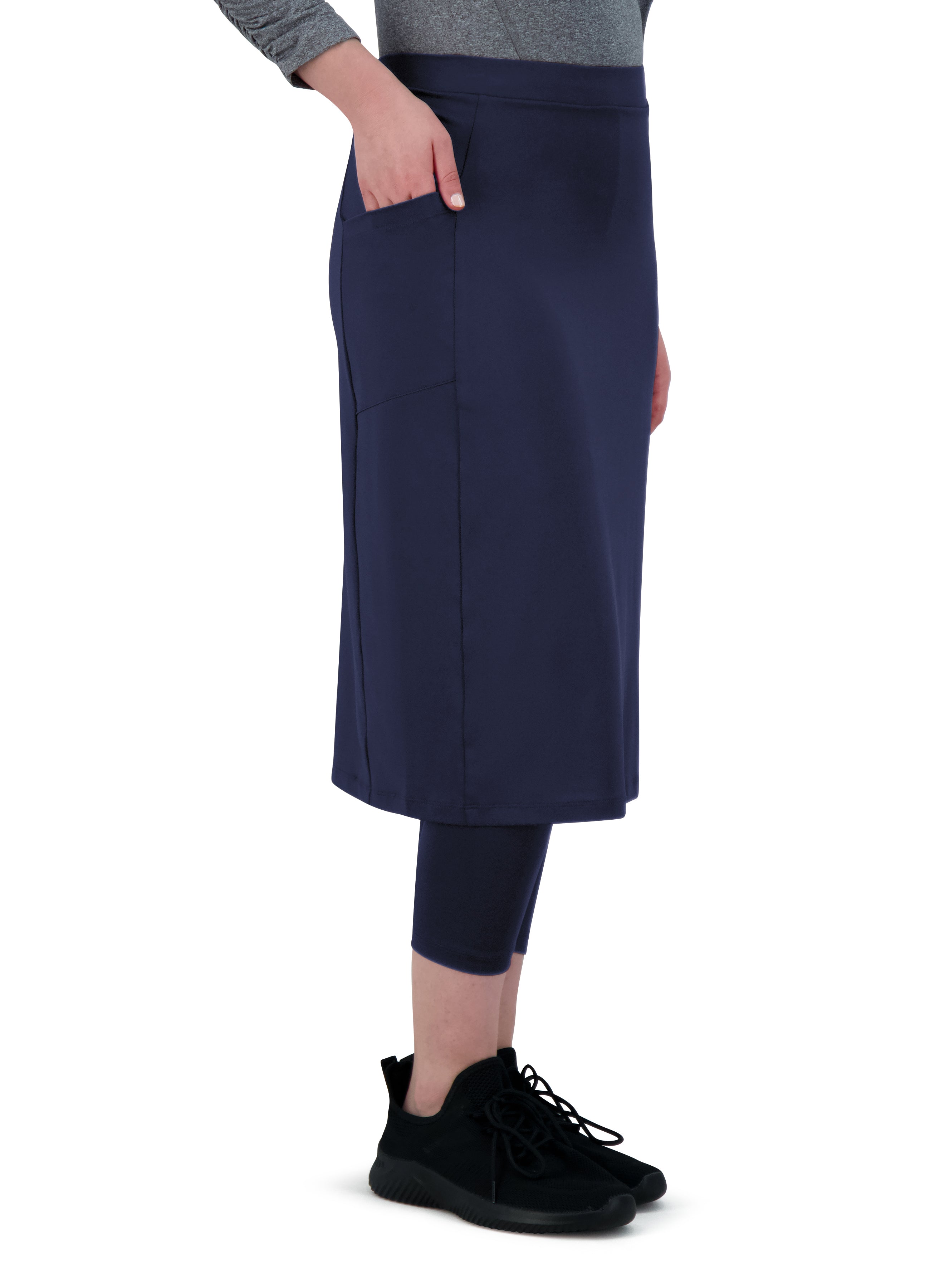 Snoga Athletics navy activewear skirt with leggings and side pocket, shown on model