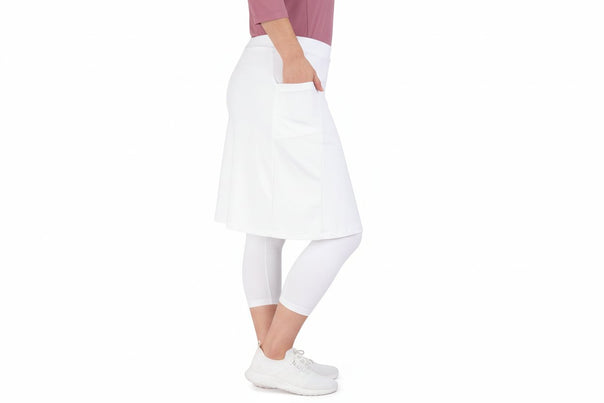 Woman wearing Snoga Athletics blue modest skirt leggings and white top