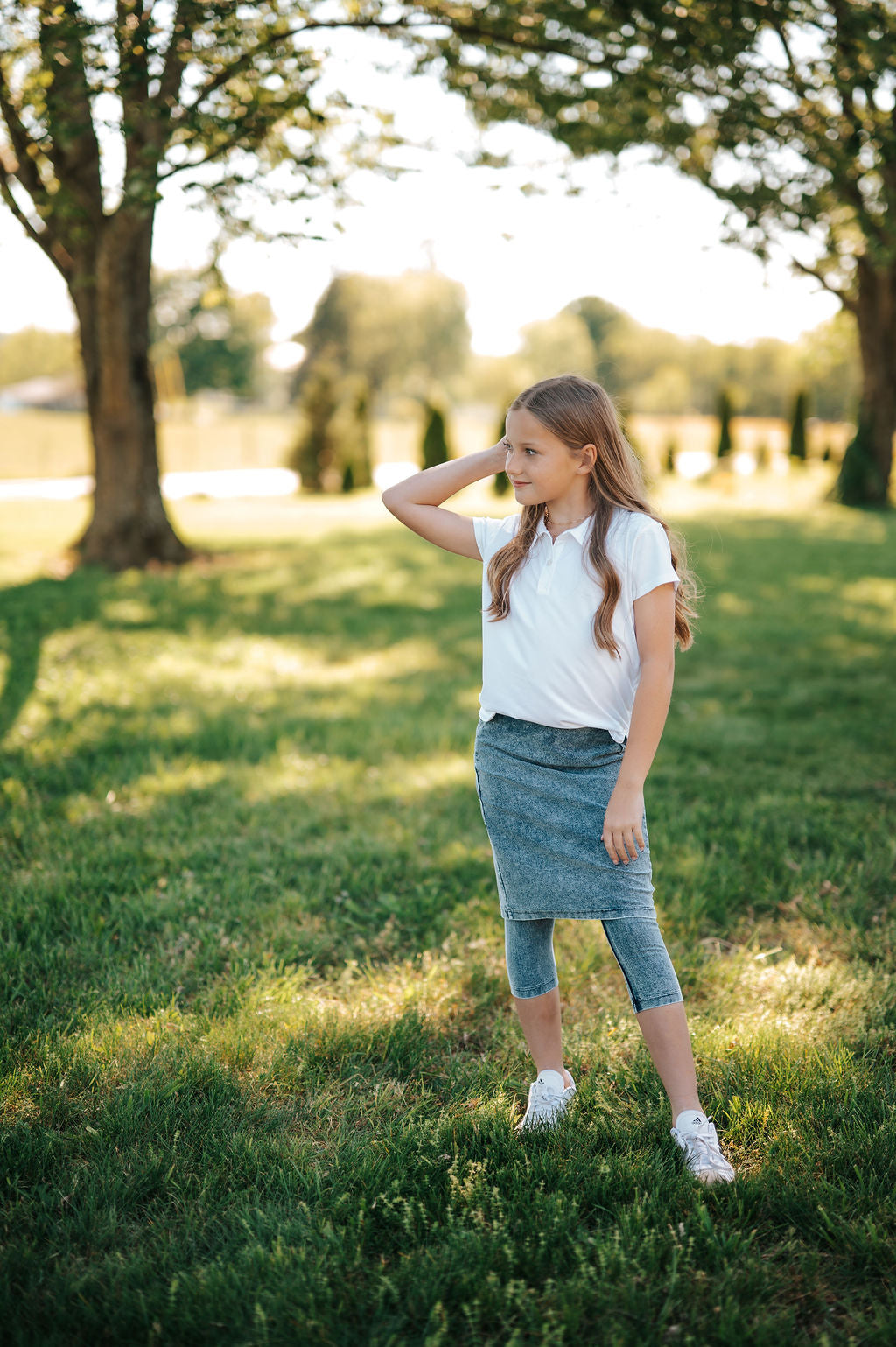 Girls Fit Snoga Denim by Snoga Athletics, kids' stretchy denim sports leggings, shown on a child in a natural pose.
