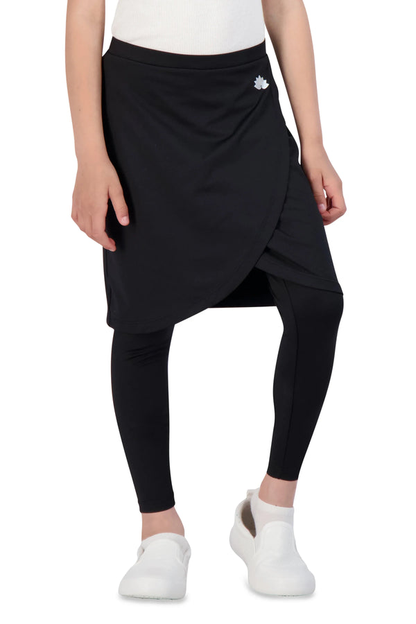 Girl wearing Snoga Athletics black ankle faux wrap activewear skirt with attached leggings