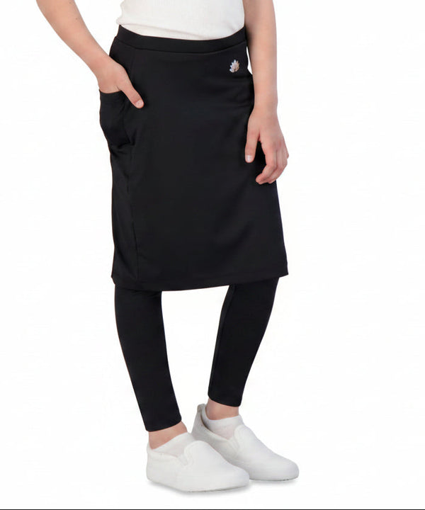 Snoga Athletics girls' black ankle-fit skirted leggings with side pockets and white slip-on shoes