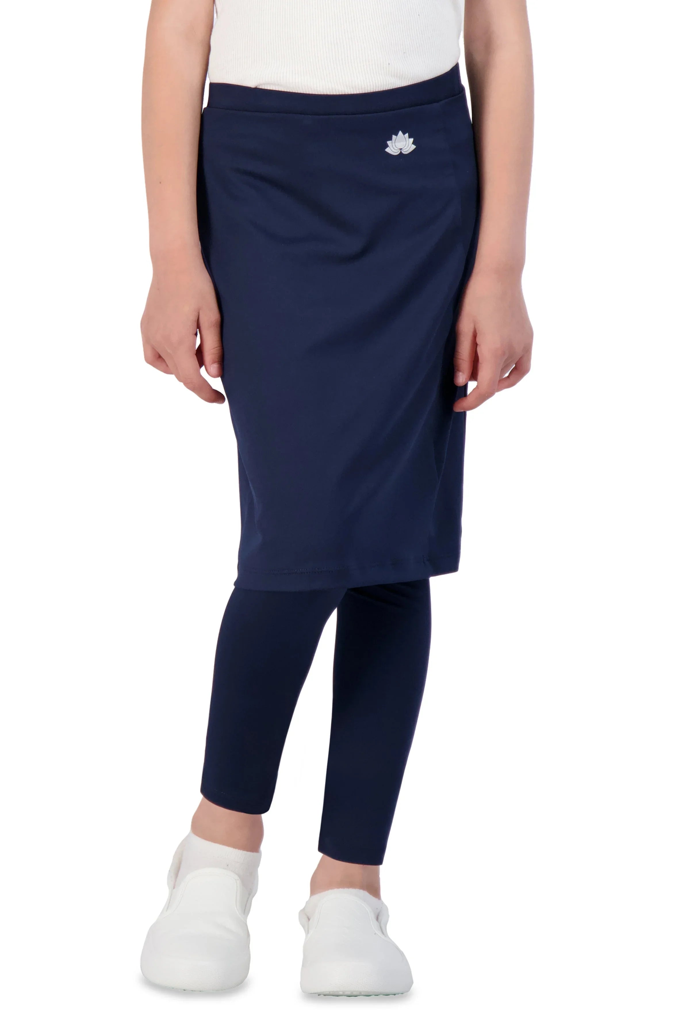 Girl wearing navy skirted leggings with lotus logo from Snoga Athletics