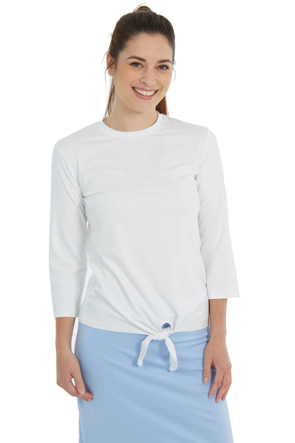 Woman wearing Snoga Athletics chalk white tie-front active tee with 3/4 sleeves