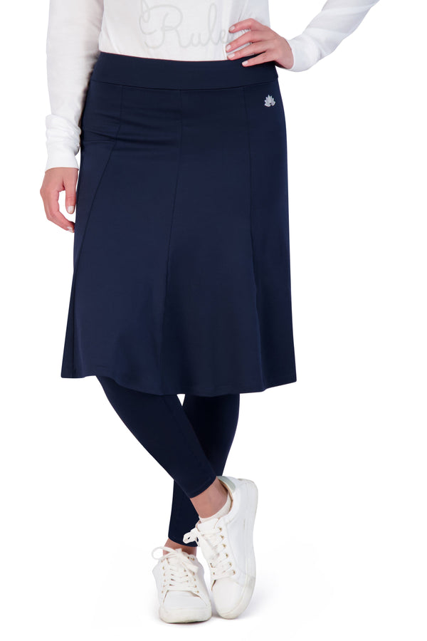 Snoga Athletics navy modest skirt leggings combo with white sneakers, front view