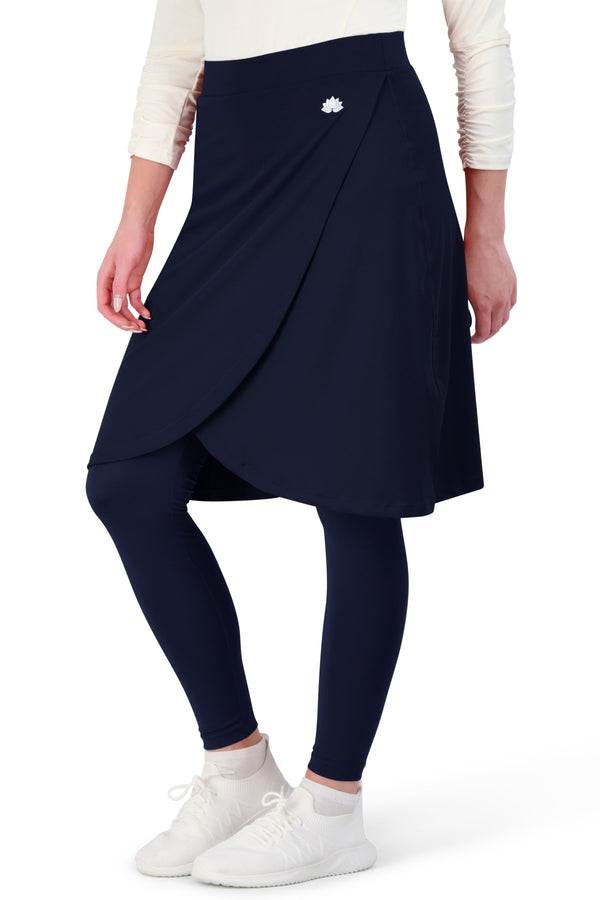 Snoga Athletics navy ankle faux wrap skirt with attached leggings and lotus logo