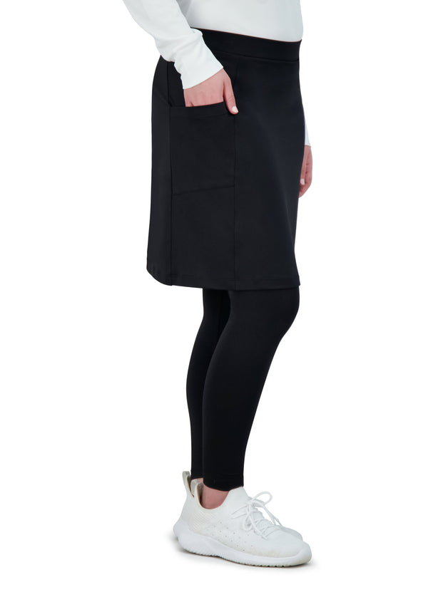 Woman wearing Snoga Athletics black ankle-fit skirt leggings with side pocket
