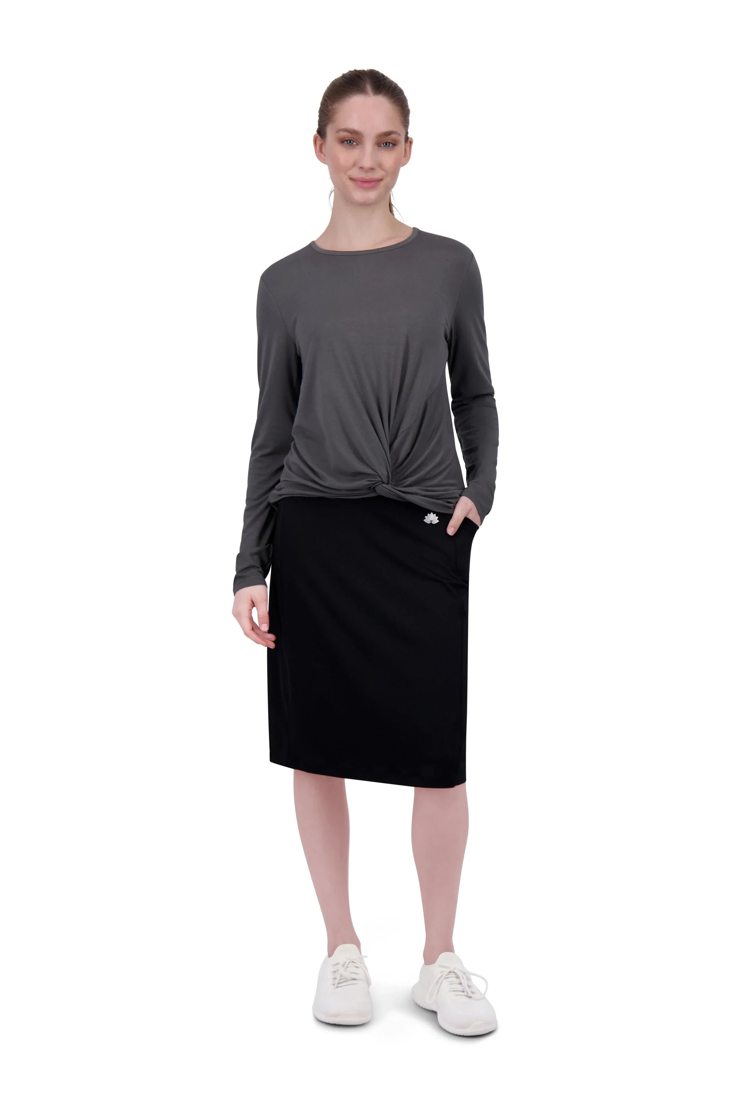 Woman wearing Snoga Athletics black modest skirted leggings with double pockets