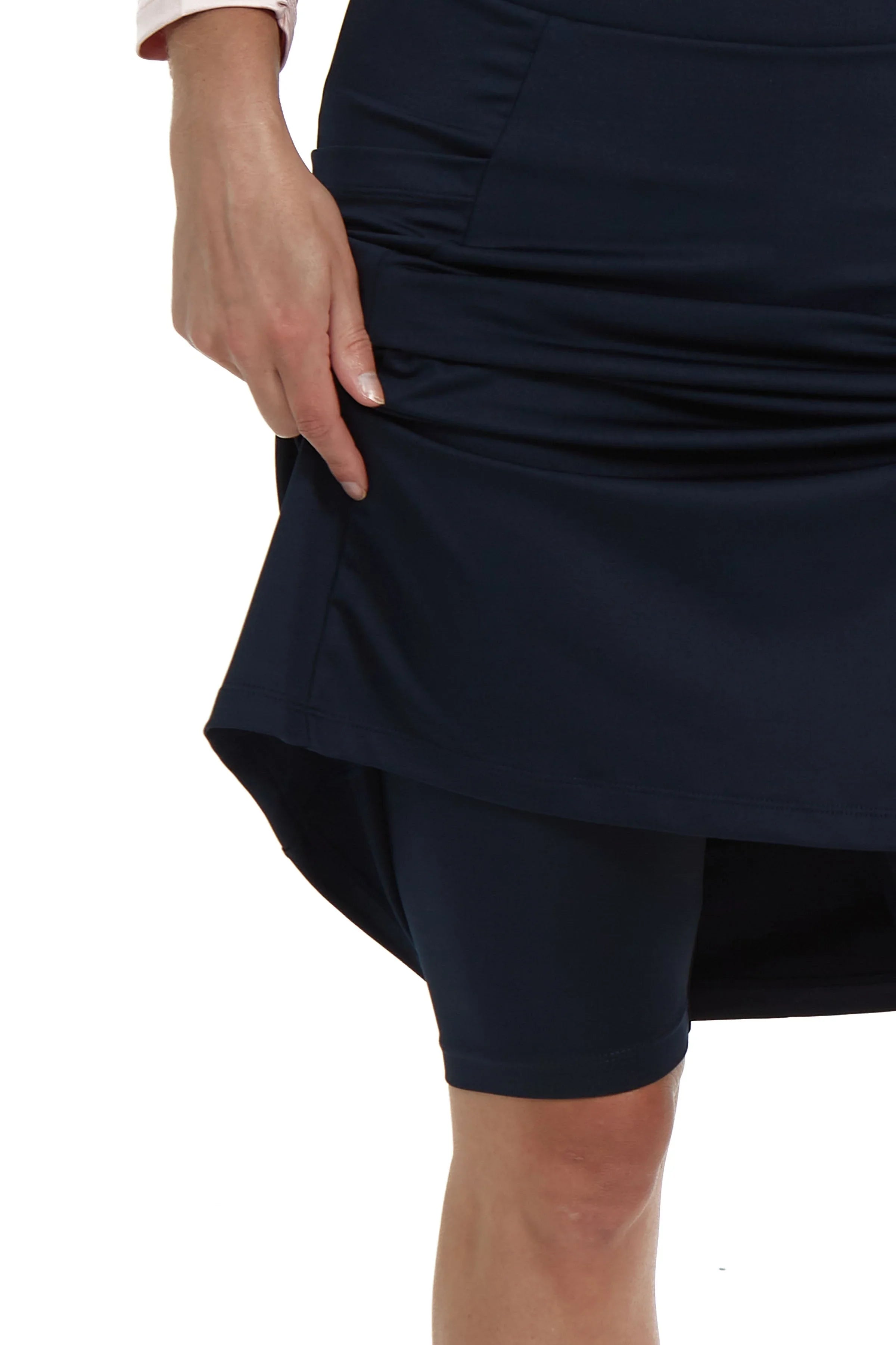 Snoga Athletics navy athletic skort with attached shorts, close-up view