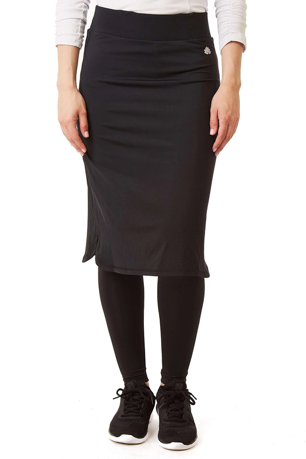 Woman wearing black long skirt with attached leggings by Snoga Athletics