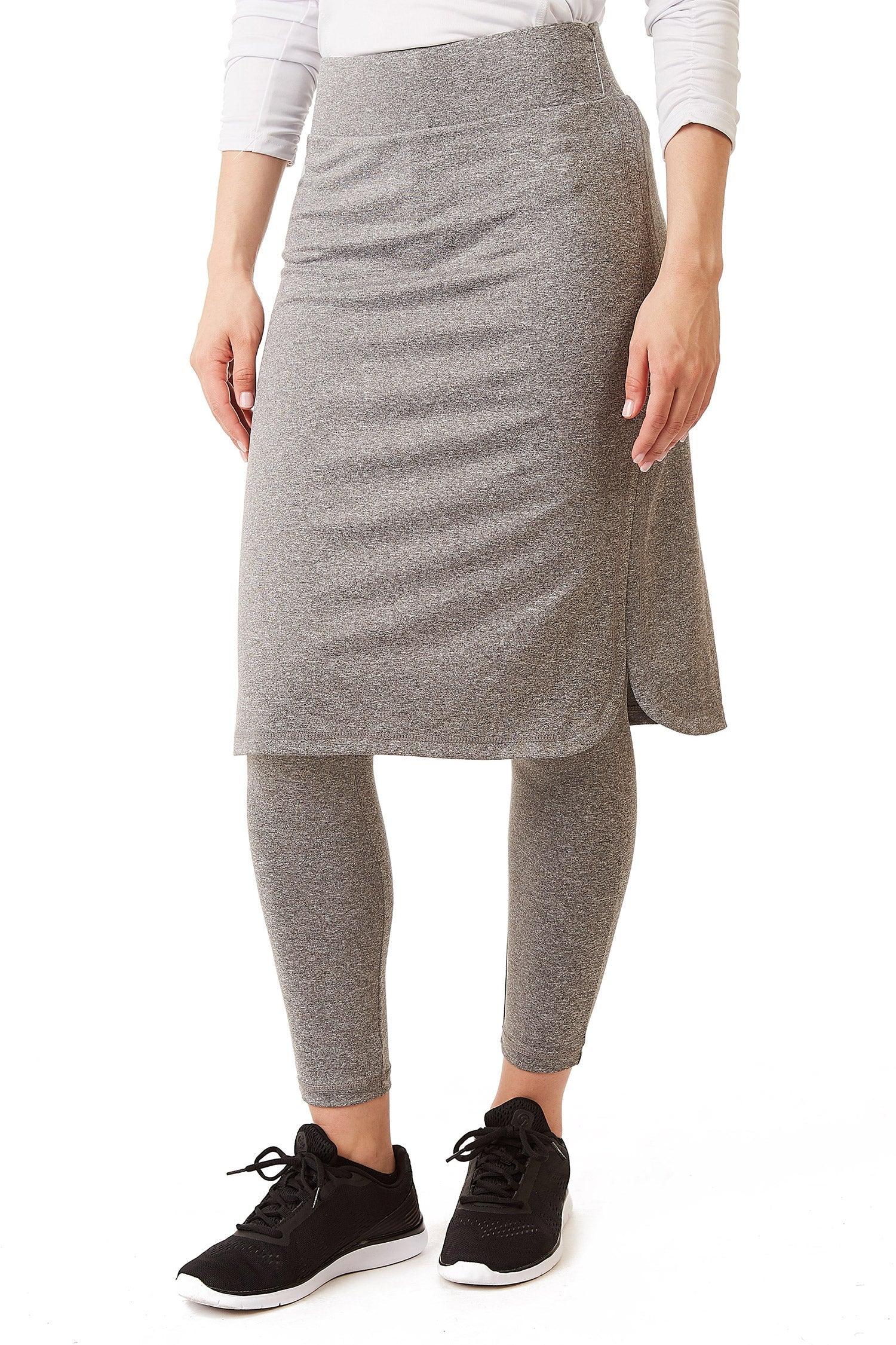 Woman wearing Snoga Athletics heather grey long shirttail skirt with attached leggings