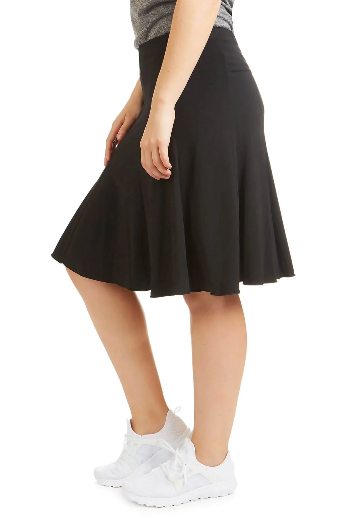 Snoga Athletics black twirly pull-on modest active skirt, side view on model