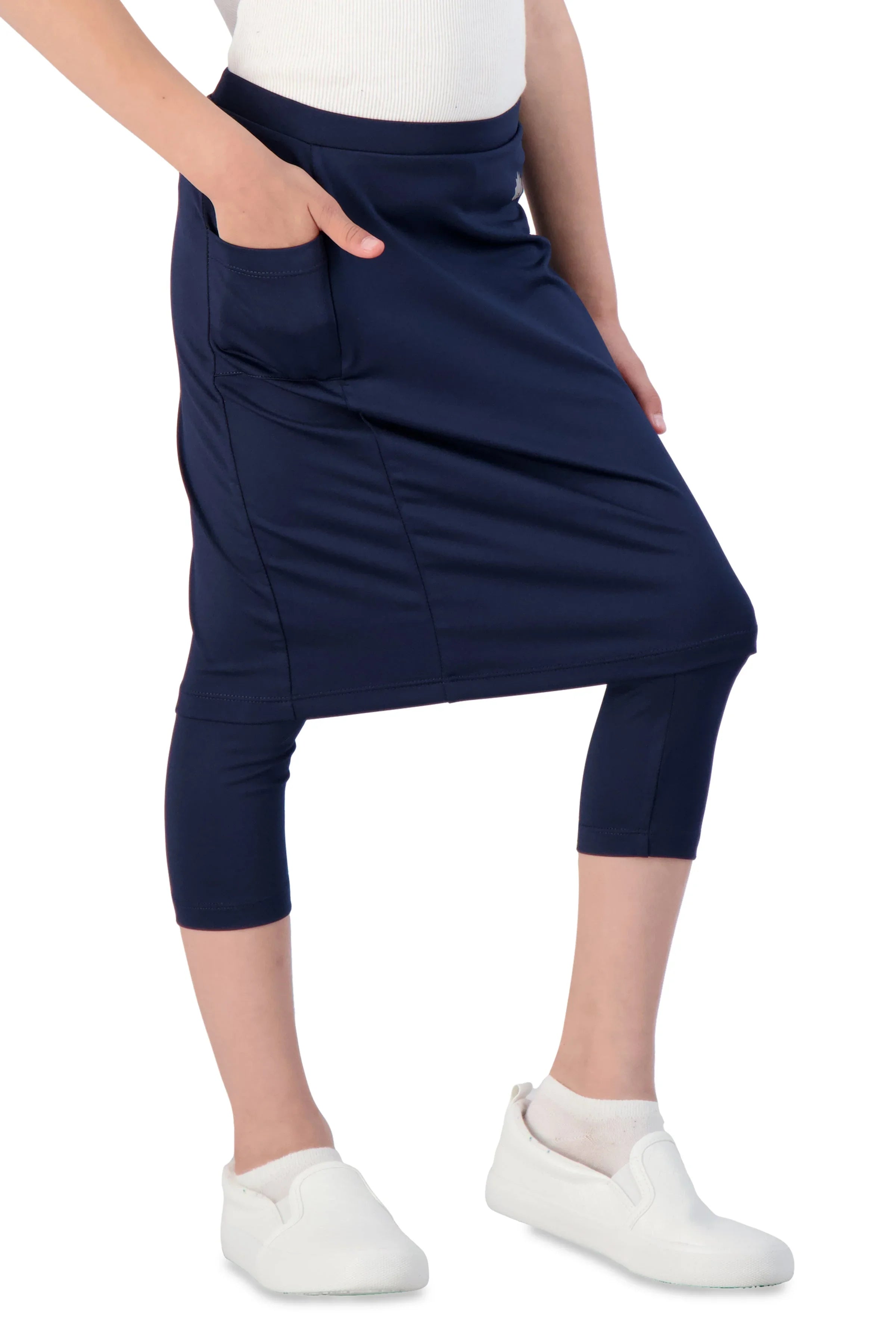 Girl wearing navy pocket skirted leggings from Snoga Athletics, modest activewear