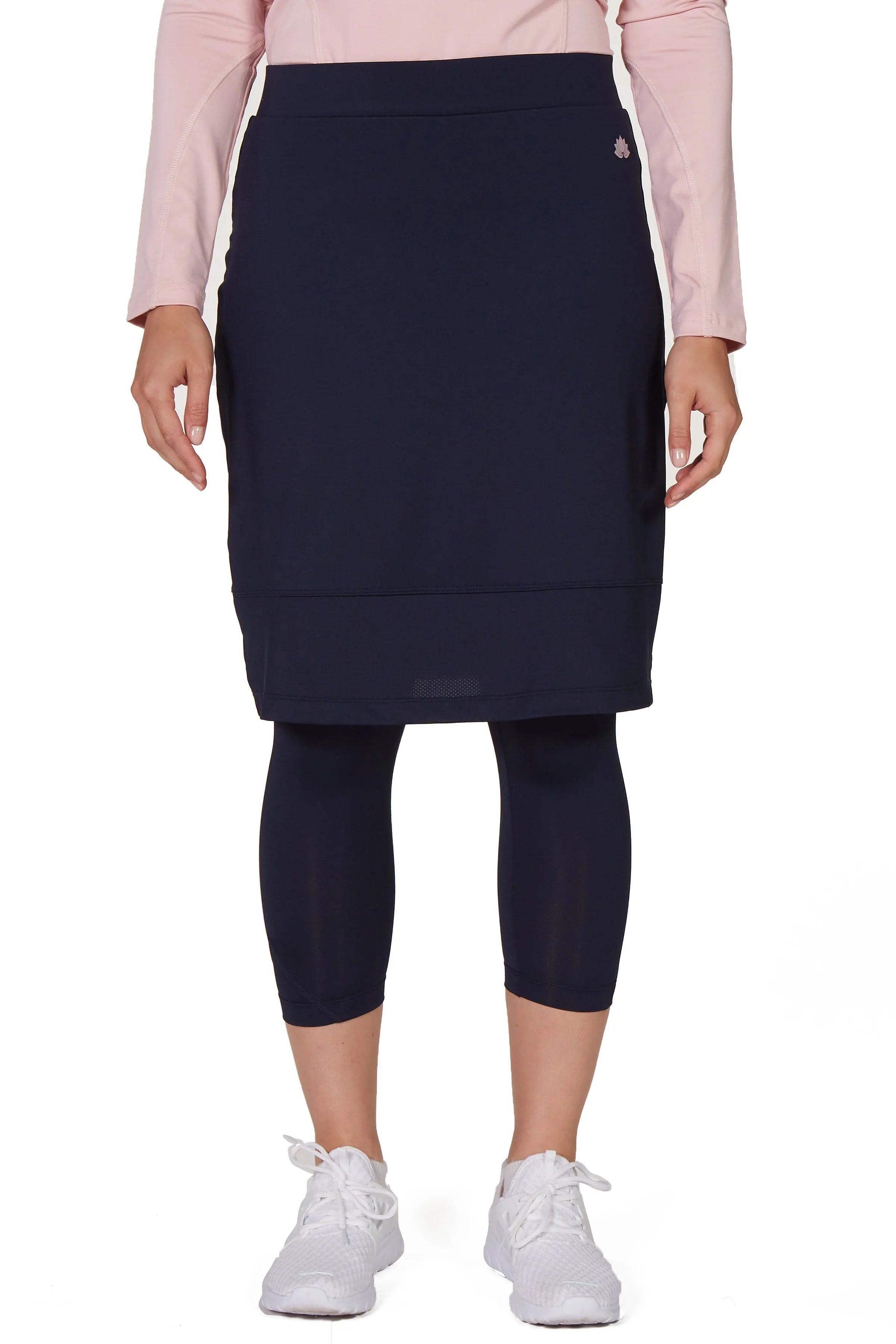 Snoga Athletics navy modest skirt with attached leggings, front view on model