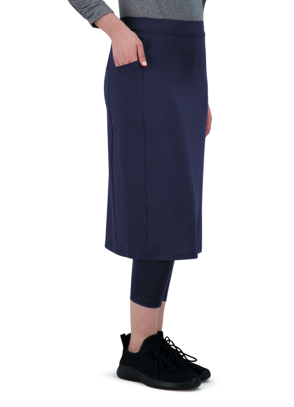 Snoga Athletics navy activewear skirt with leggings and side pocket, shown on model