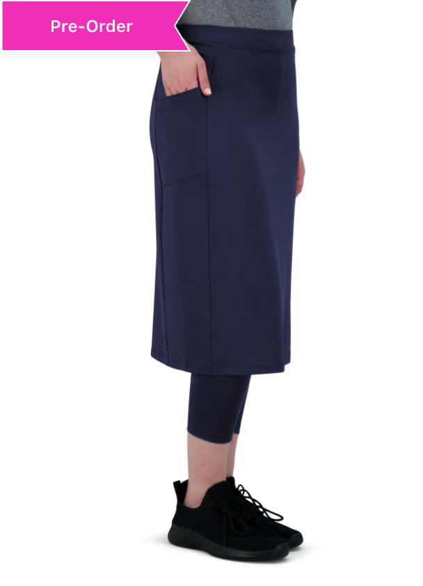 Snoga Athletics navy activewear skirt with leggings and side pocket, shown on model