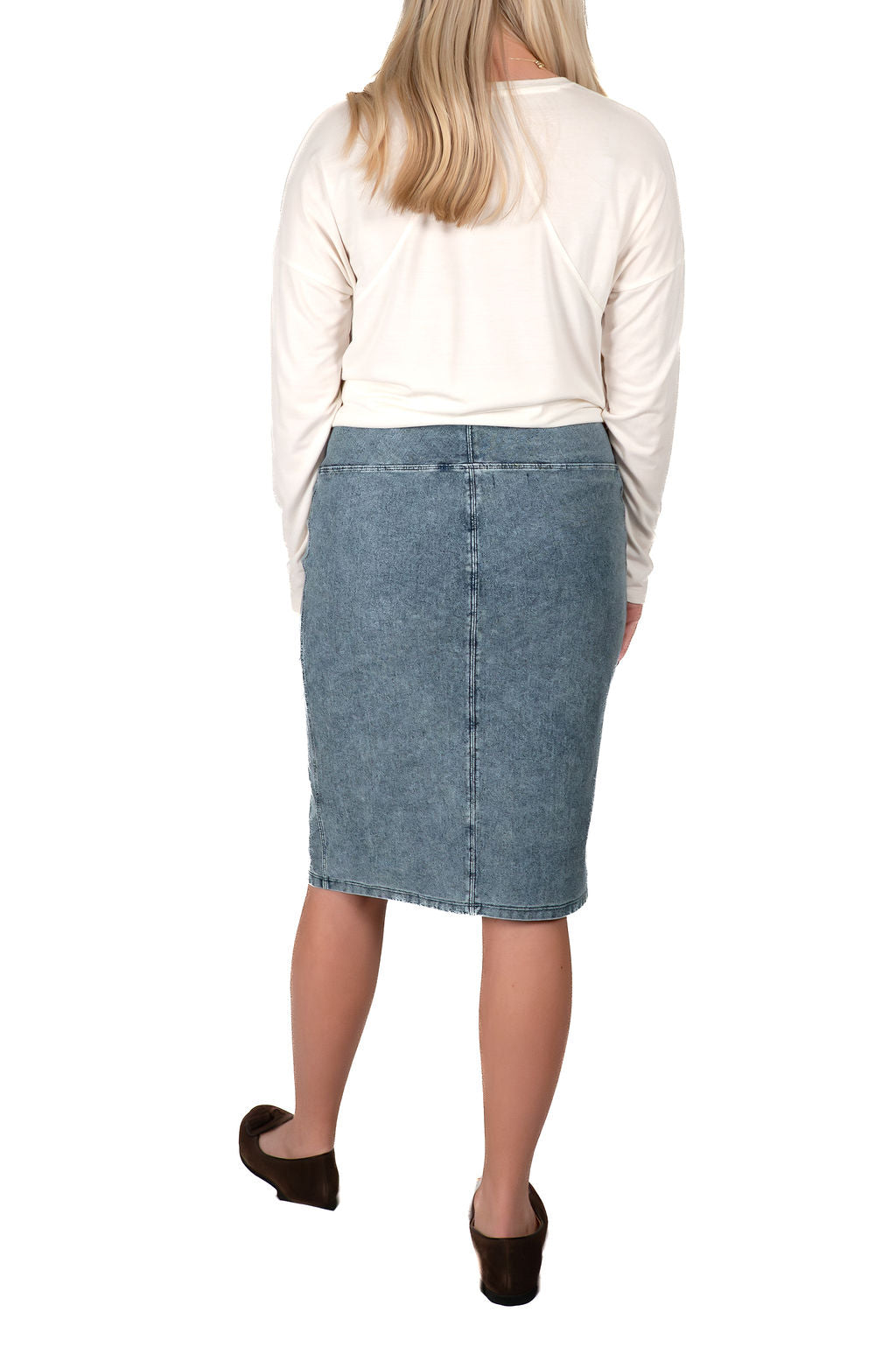 Snoga Athletics modest denim pencil skirt on model, back view, paired with white top