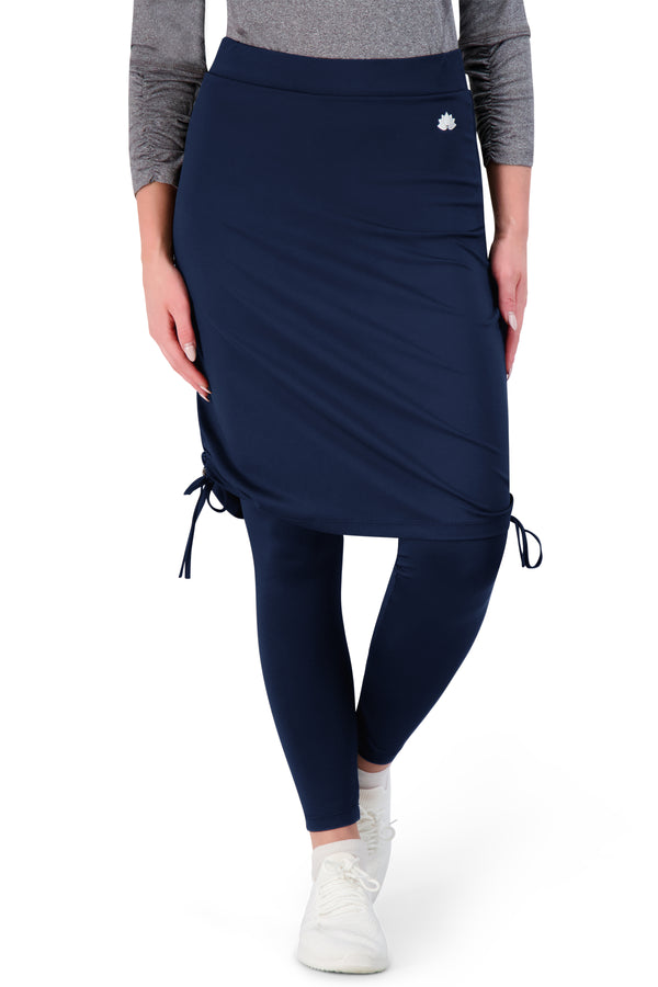 Snoga Athletics navy modest sports skirt with attached leggings, drawstring sides, and logo