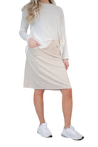 Snoga Athletics Fit Skort Snoga 22-inch Moonbeam with built-in shorts, lightweight fabric, and elastic waistband for active wear.