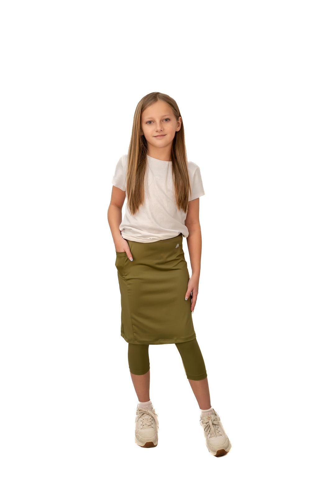 Girl modeling olive modest skirt leggings set from Snoga Athletics on white background