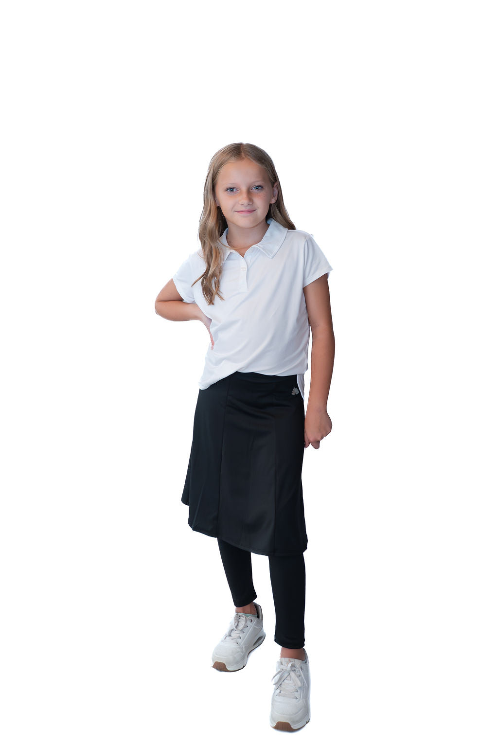 Girl wearing Snoga Athletics modest black skirt leggings and white polo shirt