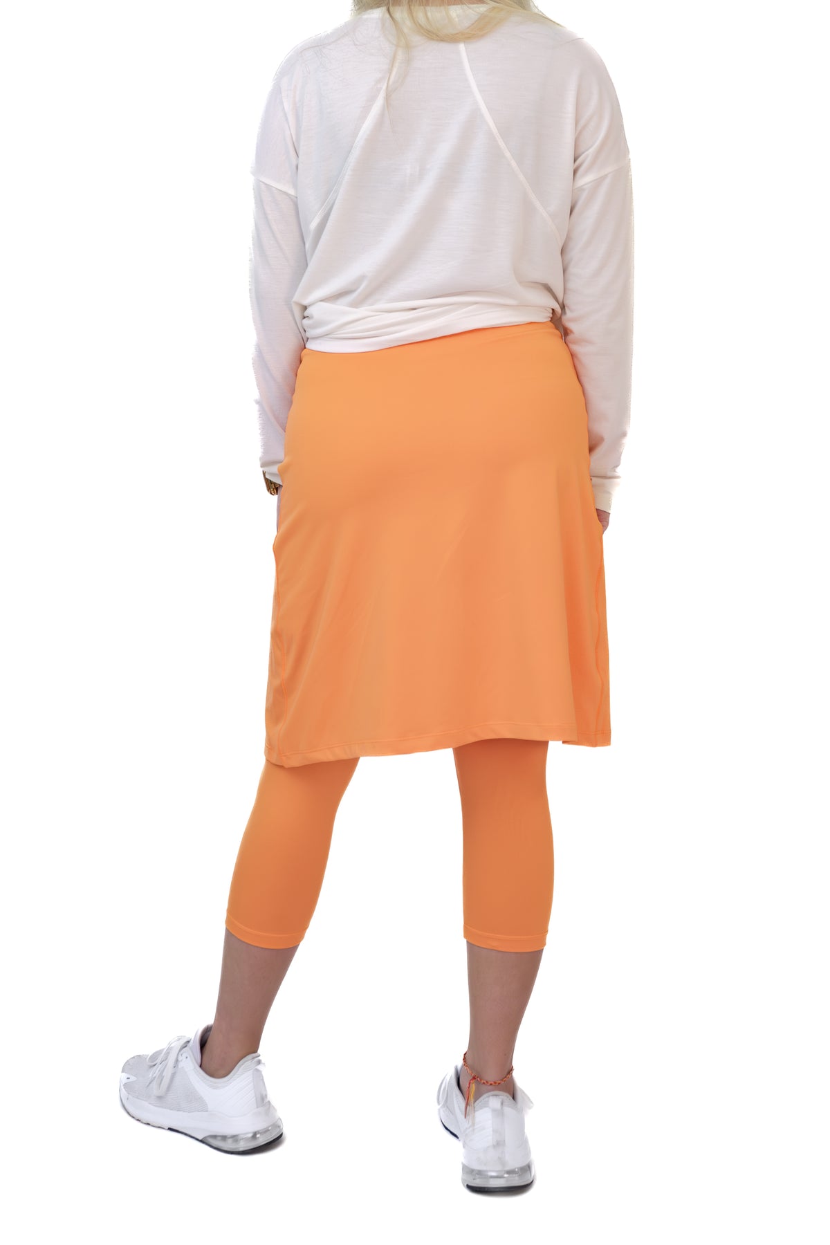 Snoga Athletics Faux Wrap Snoga in Musk Melon, 22-inch length, featuring a stylish faux wrap design in bright musk melon color.