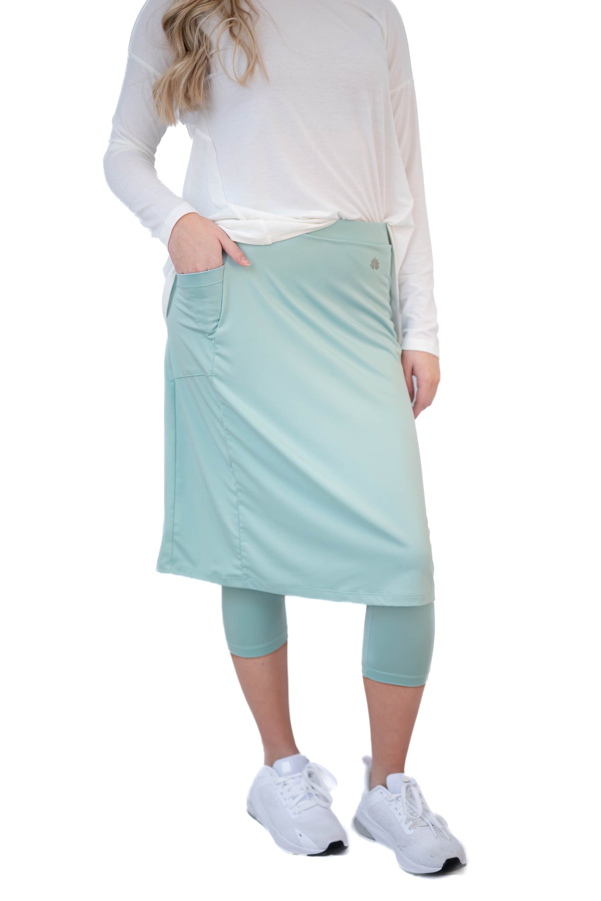 Pastel turquoise Fit Snoga 24-inch athletic snoga by Snoga Athletics, shown on a model in a fitness pose.