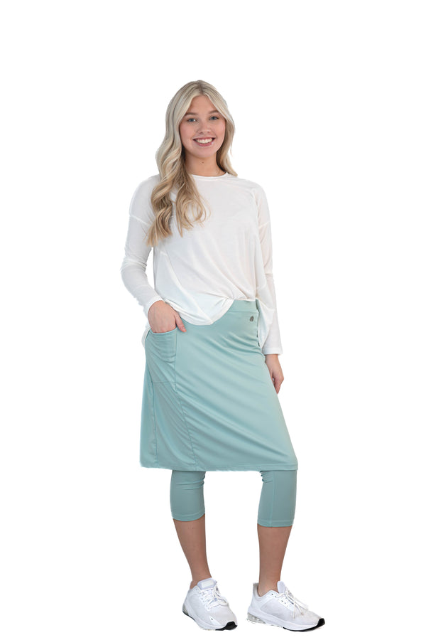 Pastel turquoise Fit Snoga 22-inch athletic snoga from Snoga Athletics displayed on a model, showcasing its comfortable fit and stretch.