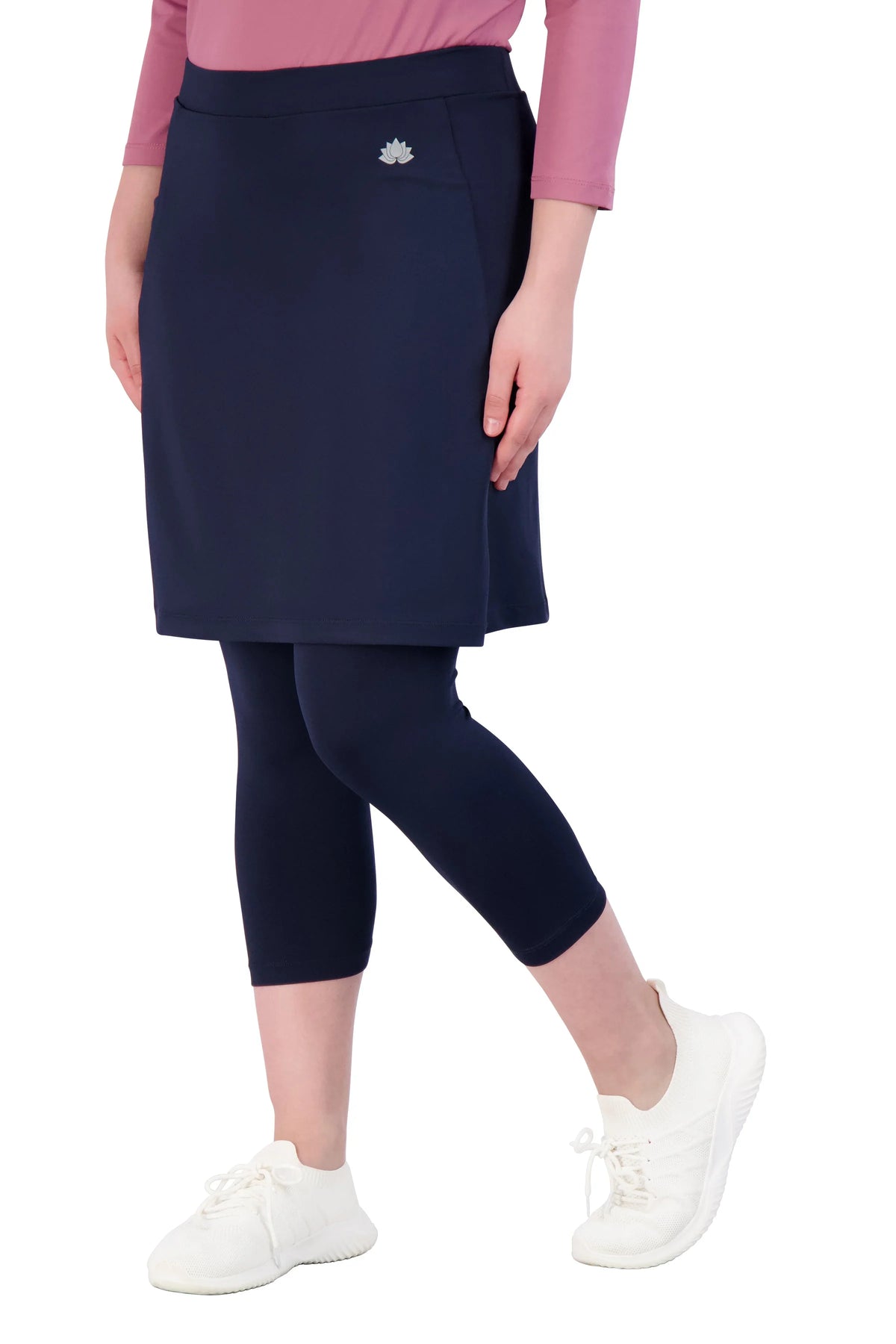 Snoga Athletics navy 3/4 length leggings with attached modest skirt, lotus logo visible