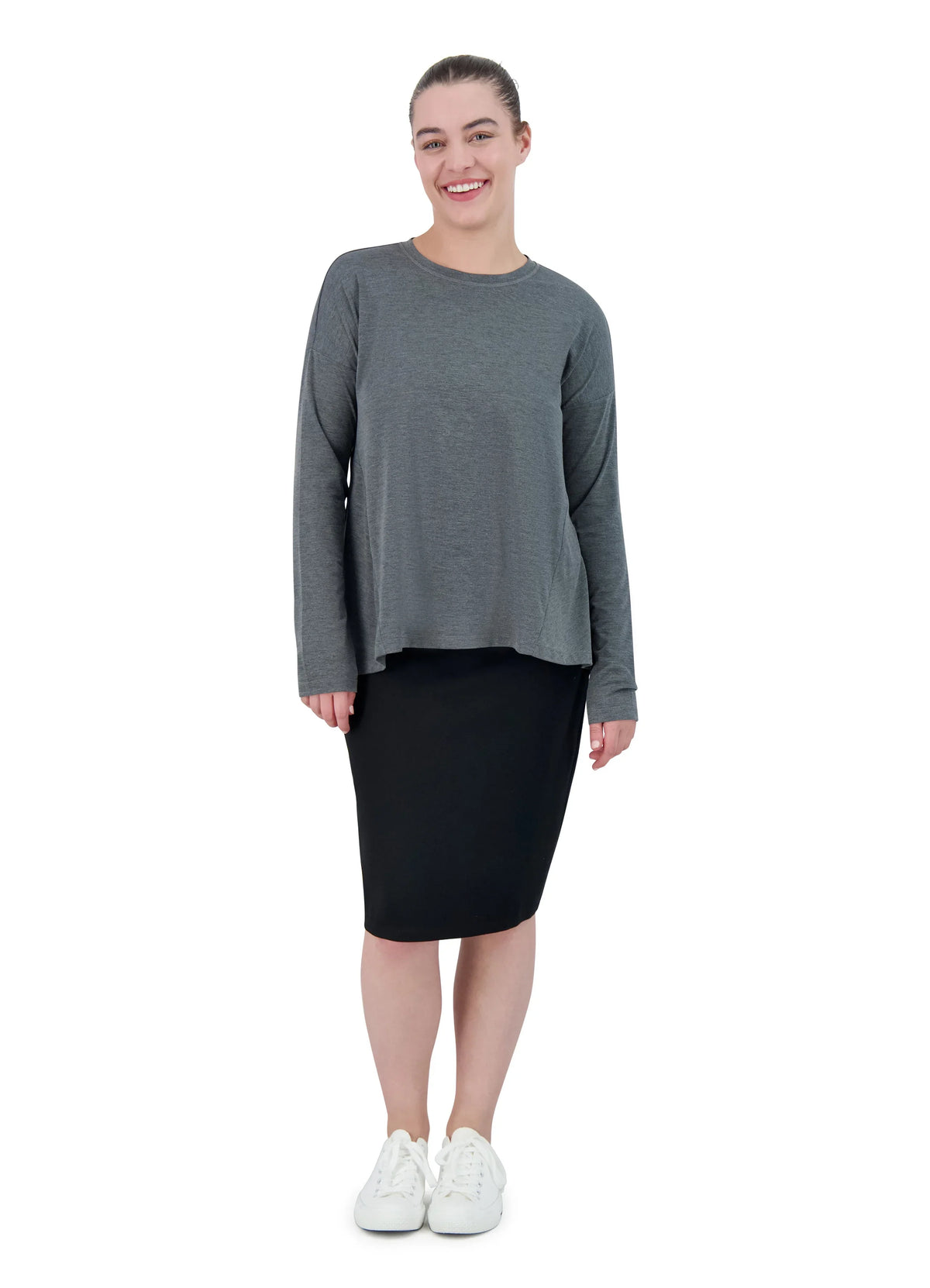 Woman wearing Snoga Athletics black ponte knee-length pencil skirt and grey long-sleeve top
