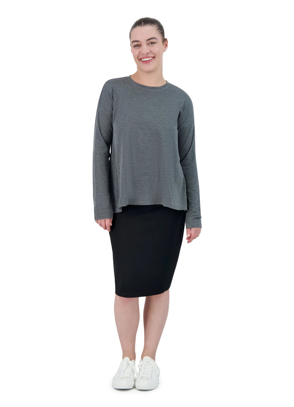 Woman wearing Snoga Athletics black ponte knee-length pencil skirt and grey long-sleeve top
