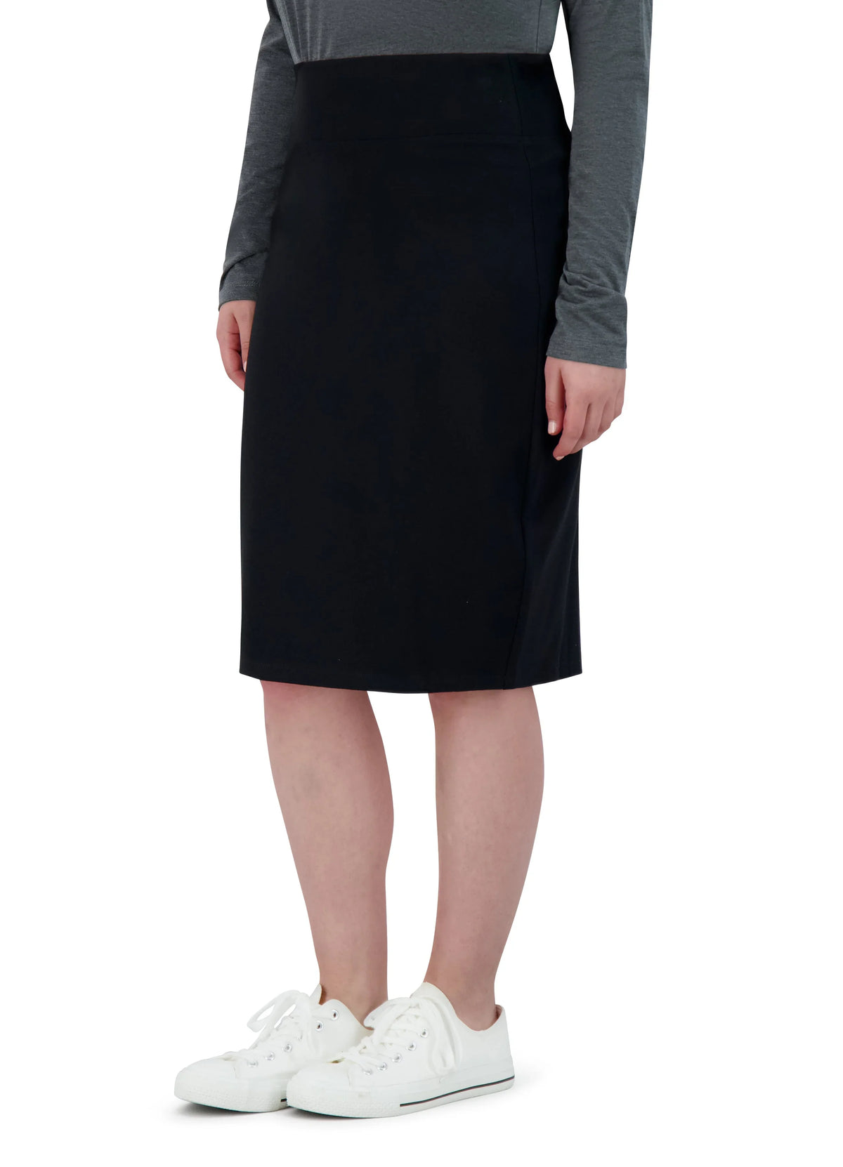 Snoga Athletics black ponte knee-length pencil skirt on model with white sneakers
