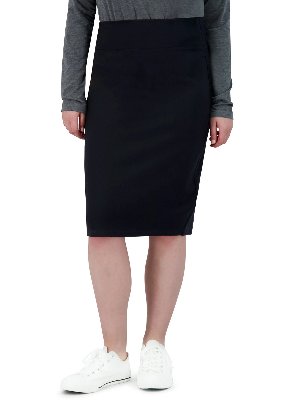 Snoga Athletics black ponte knee-length pencil skirt on model, paired with sneakers