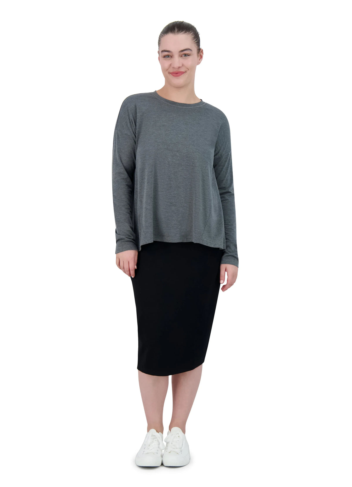 Woman in Snoga Athletics black ponte knee-length pencil skirt and gray top