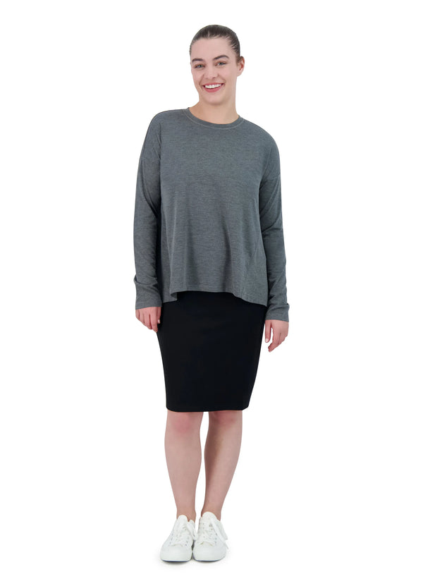 Woman wearing Snoga Athletics black ponte pencil skirt and grey long sleeve top