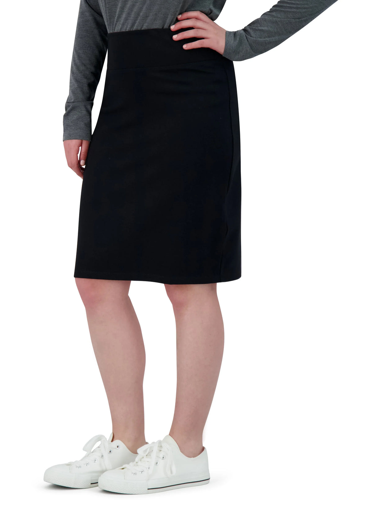Snoga Athletics black knee-length ponte pencil skirt, size-inclusive, worn with sneakers