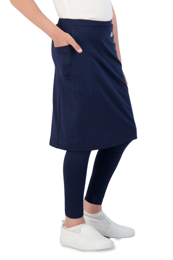 Girl wearing Snoga Athletics navy ankle-length skirt with leggings and white shoes