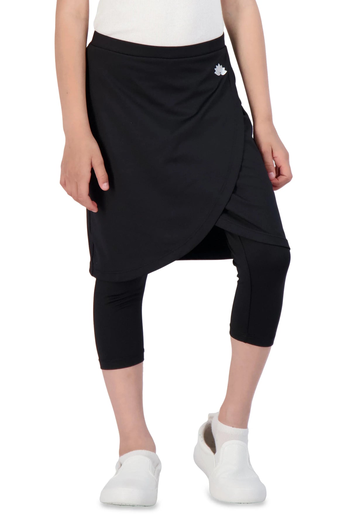 Girl wearing Snoga Athletics black faux wrap skirt with attached leggings