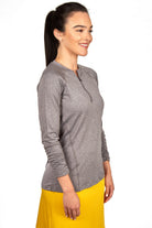Woman wearing Snoga Athletics heather grey long sleeve active top with front zipper