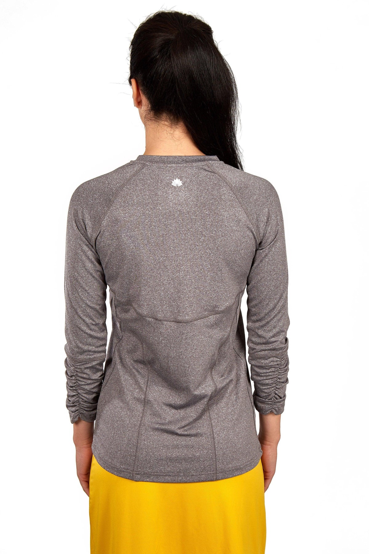 Back view of woman wearing Snoga Athletics heather grey long sleeve active top