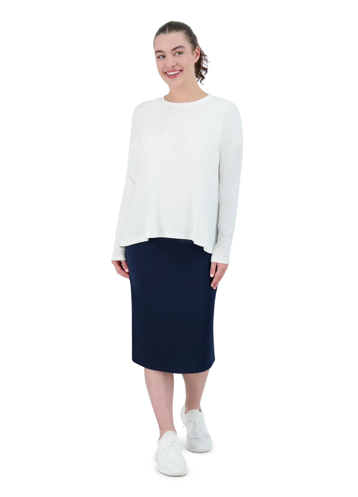 Woman wearing Snoga Athletics navy pencil skirt and white long sleeve top