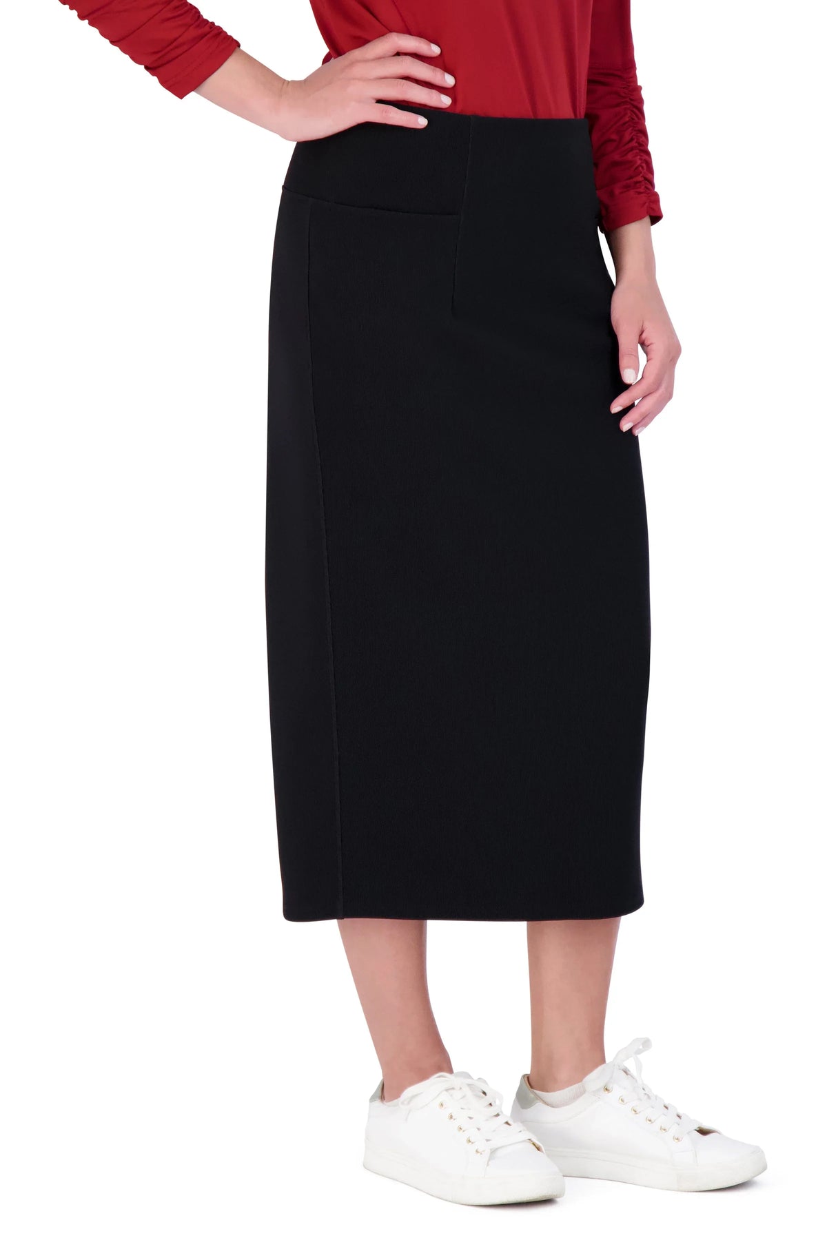 Snoga Athletics black ribbed pencil skirt with stretch fabric, worn by a model with white sneakers