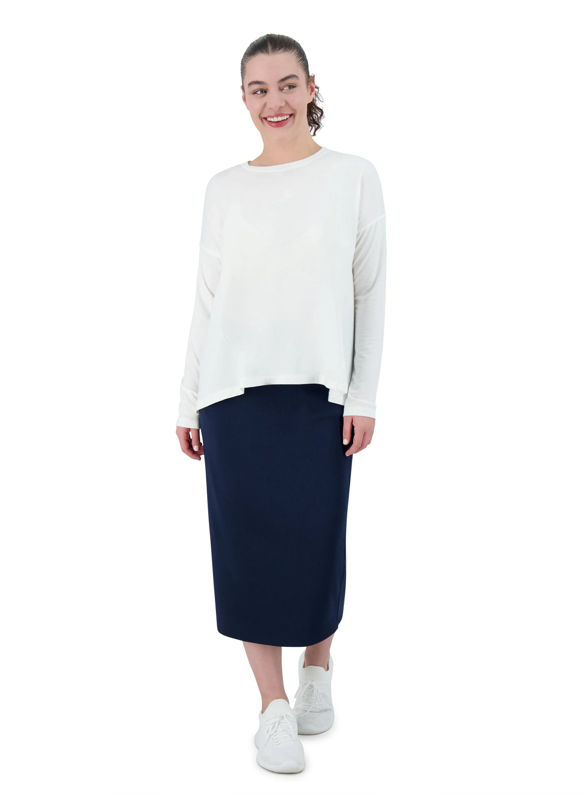 Woman wearing Snoga Athletics navy ribbed stretch pencil skirt and white long-sleeve top