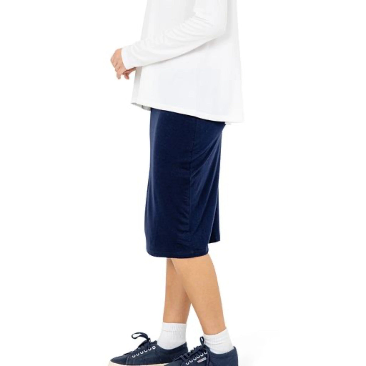 Snoga Athletics navy modest active skirt with white top and sneakers