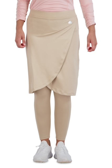 Snoga Athletics beige ankle faux wrap skirt with matching leggings, worn by model