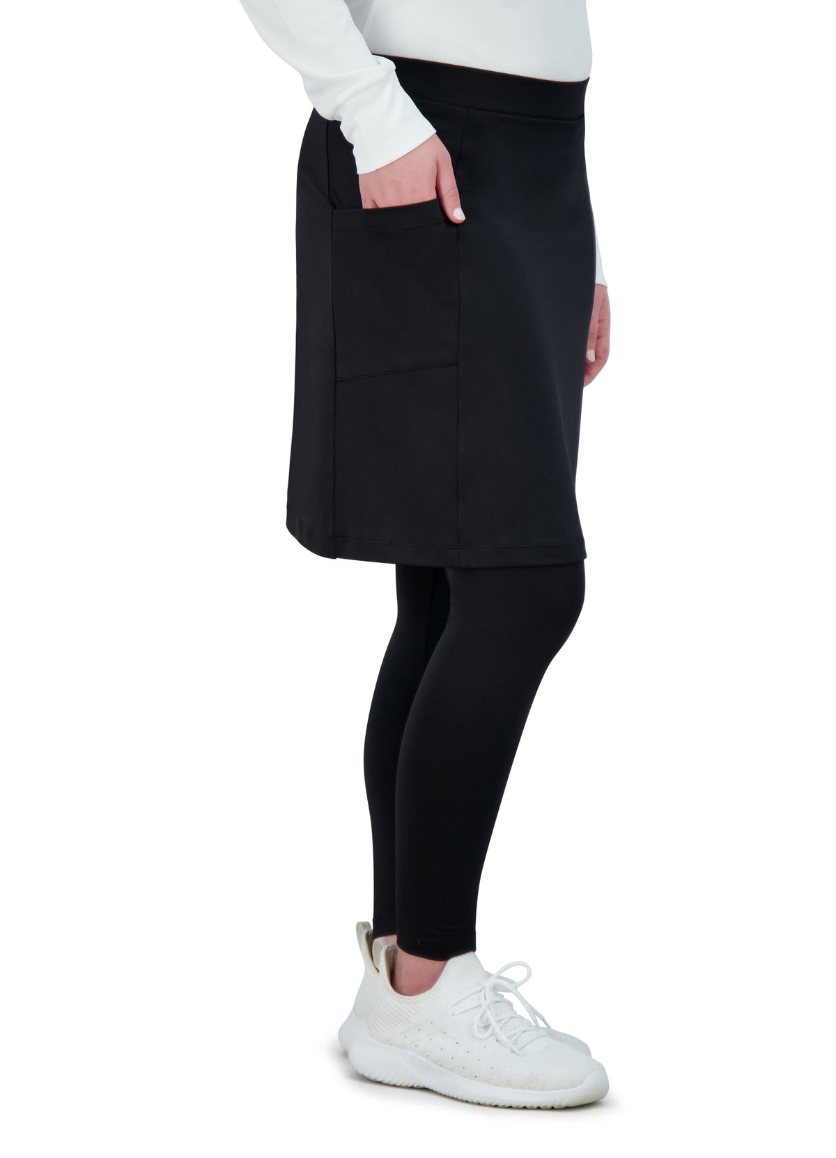 Woman wearing Snoga Athletics black ankle-fit skirt leggings with side pocket