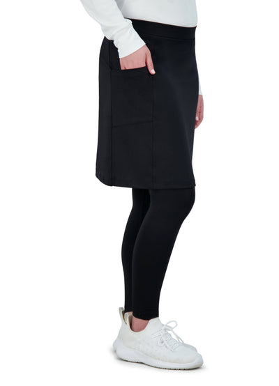 Woman wearing Snoga Athletics black ankle-fit skirt leggings with side pocket