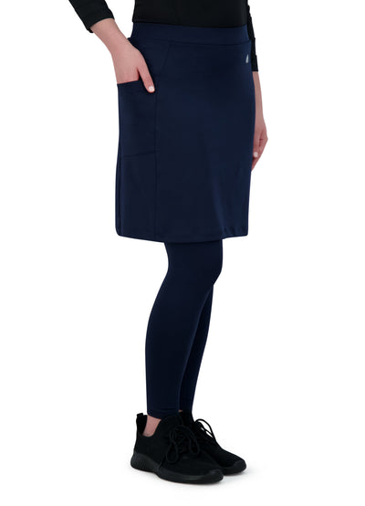Snoga Athletics navy ankle-length skirt with attached leggings, side pocket, athletic shoes