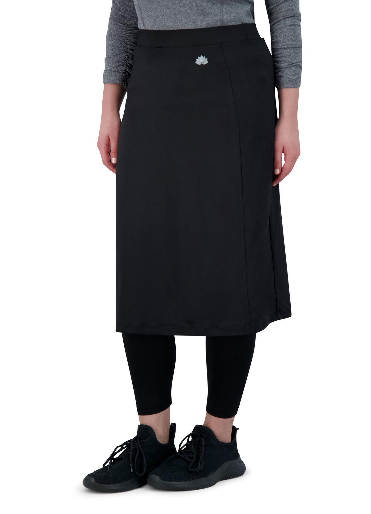 Snoga Athletics black ankle-fit skirt leggings with lotus logo, modest activewear