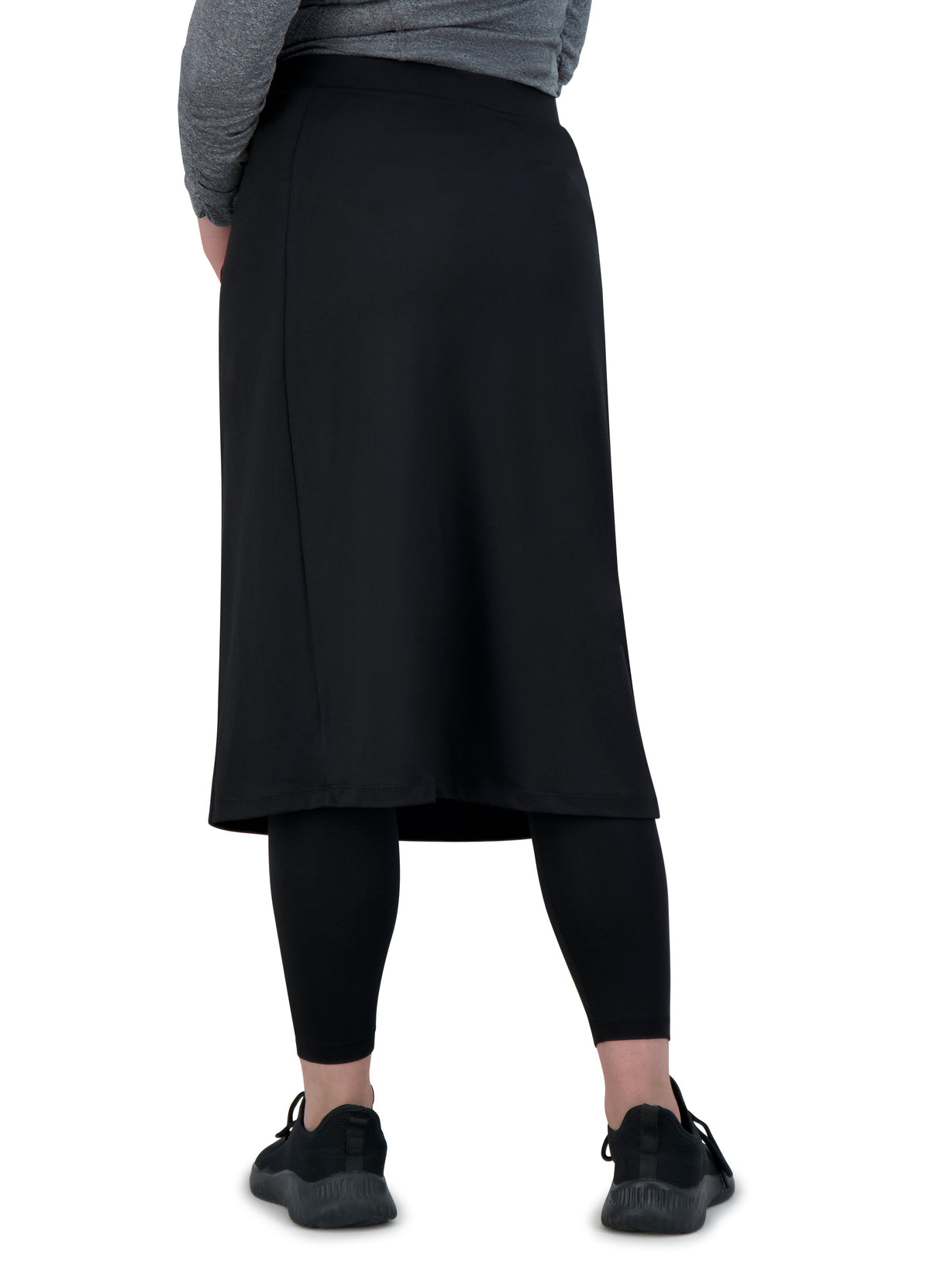 Snoga Athletics black ankle-fit skirted leggings, back view on model