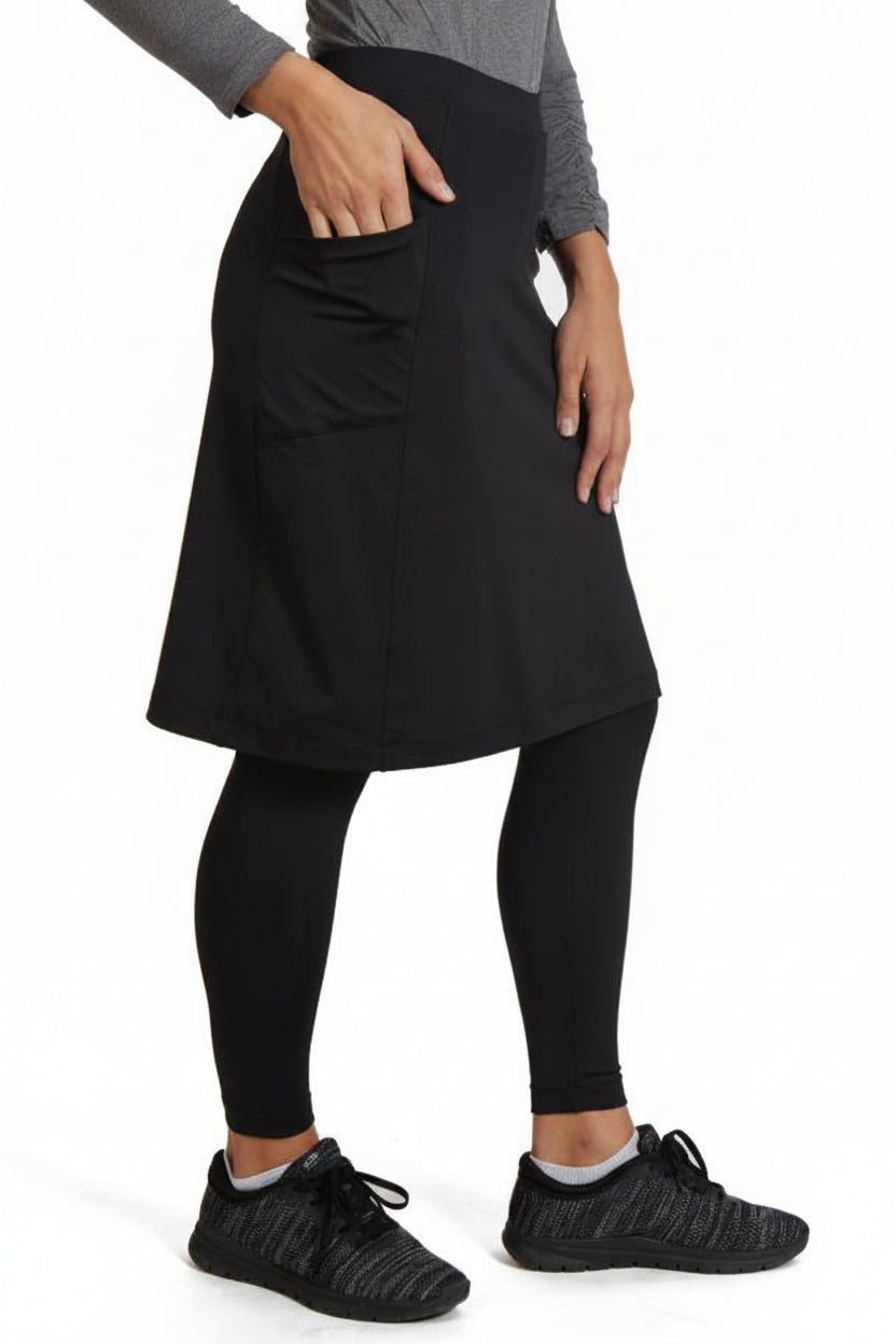 Snoga Athletics black ankle-fit skirt leggings with side pocket, shown on model